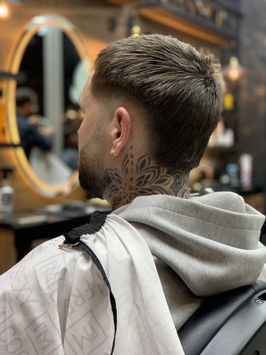 Strakke coupe met taper, geknipt bij Old City Barbershop